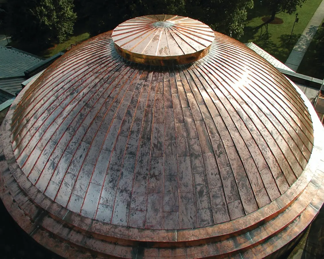 Craftsman Roofing crew installing a new roof in Ponca City